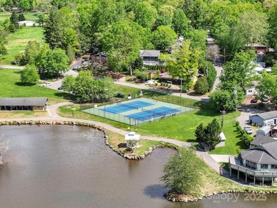 Beautifully furnished 3BR/2BA ranch ideally located within on Black Mountain Golf Course in North Carolina - for sale on GolfHomes.com, golf home, golf lot