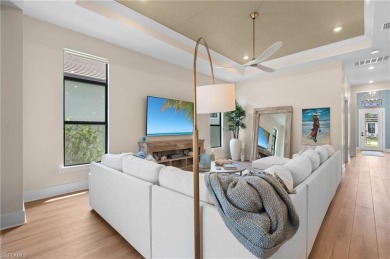 Live the unparalleled lakefront lifestyle you've always dreamed on Naples National Golf Club in Florida - for sale on GolfHomes.com, golf home, golf lot