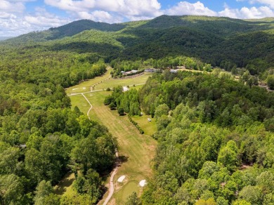 Uncover the charm of luxurious living at this exquisite on The Rock At Jocassee in South Carolina - for sale on GolfHomes.com, golf home, golf lot