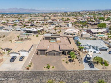 Welcome to this one-of-a-kind custom estate in the coveted on London Bridge Golf Course in Arizona - for sale on GolfHomes.com, golf home, golf lot