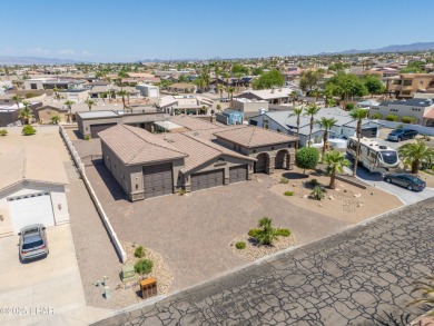 Welcome to this one-of-a-kind custom estate in the coveted on London Bridge Golf Course in Arizona - for sale on GolfHomes.com, golf home, golf lot