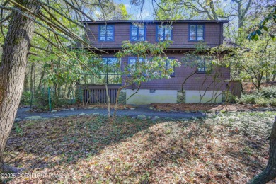 ''Hemlock Lodge'' is a charming 4-bedroom cottage filled with on Buck Hill Golf Club  in Pennsylvania - for sale on GolfHomes.com, golf home, golf lot