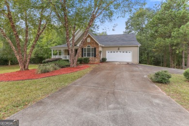 Discover the perfect blend of comfort and scenic beauty at on The Club at Shoal Creek Golf Course in Georgia - for sale on GolfHomes.com, golf home, golf lot