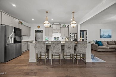 Welcome to refined living in the prestigious Hasentree, where on Hasentree Club in North Carolina - for sale on GolfHomes.com, golf home, golf lot