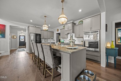 Welcome to refined living in the prestigious Hasentree, where on Hasentree Club in North Carolina - for sale on GolfHomes.com, golf home, golf lot