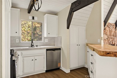 Step into this beautiful remodeled A frame cabin-a timeless on Lake Arrowhead Country Club in California - for sale on GolfHomes.com, golf home, golf lot