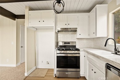 Step into this beautiful remodeled A frame cabin-a timeless on Lake Arrowhead Country Club in California - for sale on GolfHomes.com, golf home, golf lot