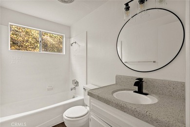 Step into this beautiful remodeled A frame cabin-a timeless on Lake Arrowhead Country Club in California - for sale on GolfHomes.com, golf home, golf lot