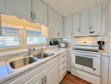 This beautifully updated two-bedroom, two-bath home offers the on Fairway Village Golf Course in Florida - for sale on GolfHomes.com, golf home, golf lot