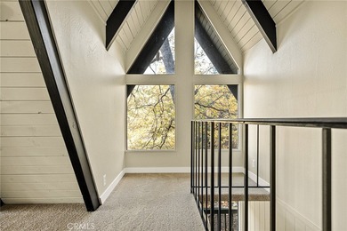 Step into this beautiful remodeled A frame cabin-a timeless on Lake Arrowhead Country Club in California - for sale on GolfHomes.com, golf home, golf lot