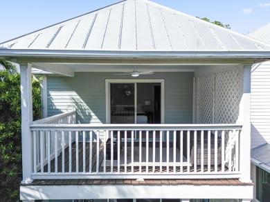 This updated 4-bedroom, 3-bathroom townhome in the gated Key on Key West Golf Club in Florida - for sale on GolfHomes.com, golf home, golf lot