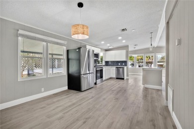 Welcome to this beautifully remodeled 2 BEDROOM 2 BATH home on Zellwood Station Country Club in Florida - for sale on GolfHomes.com, golf home, golf lot