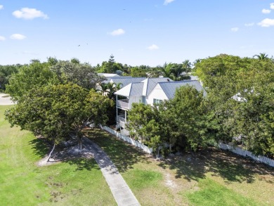 This updated 4-bedroom, 3-bathroom townhome in the gated Key on Key West Golf Club in Florida - for sale on GolfHomes.com, golf home, golf lot