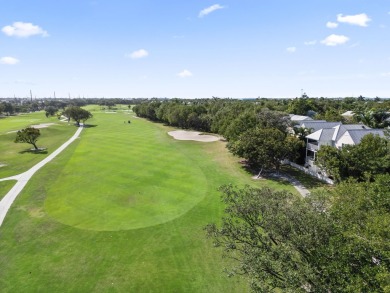 This updated 4-bedroom, 3-bathroom townhome in the gated Key on Key West Golf Club in Florida - for sale on GolfHomes.com, golf home, golf lot