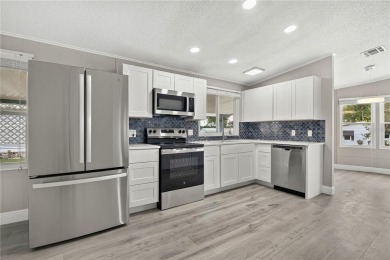 Welcome to this beautifully remodeled 2 BEDROOM 2 BATH home on Zellwood Station Country Club in Florida - for sale on GolfHomes.com, golf home, golf lot