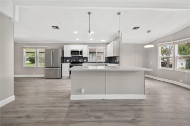 Welcome to this beautifully remodeled 2 BEDROOM 2 BATH home on Zellwood Station Country Club in Florida - for sale on GolfHomes.com, golf home, golf lot