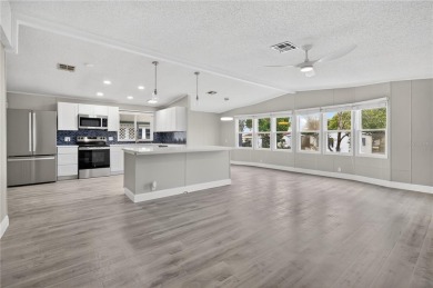 Welcome to this beautifully remodeled 2 BEDROOM 2 BATH home on Zellwood Station Country Club in Florida - for sale on GolfHomes.com, golf home, golf lot
