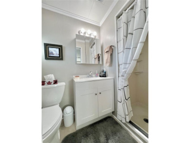 This beautifully updated two-bedroom, two-bath home offers the on Fairway Village Golf Course in Florida - for sale on GolfHomes.com, golf home, golf lot