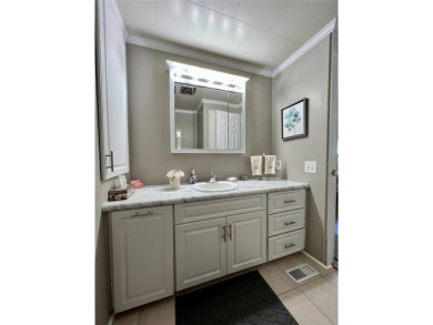 This beautifully updated two-bedroom, two-bath home offers the on Fairway Village Golf Course in Florida - for sale on GolfHomes.com, golf home, golf lot
