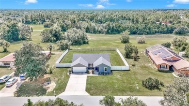 2021 CONCRETE BLOCK STUCCO BUILT HOME WITH 6 FOOT VINYL FENCED on Marion Oaks Country Club in Florida - for sale on GolfHomes.com, golf home, golf lot