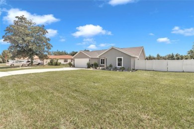 2021 CONCRETE BLOCK STUCCO BUILT HOME WITH 6 FOOT VINYL FENCED on Marion Oaks Country Club in Florida - for sale on GolfHomes.com, golf home, golf lot