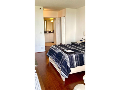 his bright 2 Bedroom, 2 Bathroom plus DEN, corner apartment on Turnberry Isle Resort and Club in Florida - for sale on GolfHomes.com, golf home, golf lot