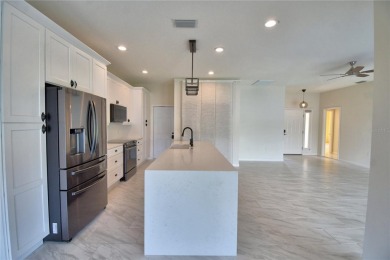 Welcome to this beautifully updated 2-bedroom, 2-bathroom home on Lake Ashton Golf Club in Florida - for sale on GolfHomes.com, golf home, golf lot