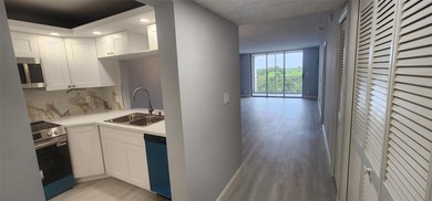 Spacious Remodel Experience the perfect blend of comfort on Palm-Aire Country Club and Resort - Palms in Florida - for sale on GolfHomes.com, golf home, golf lot