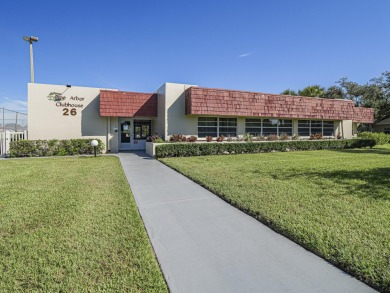his turnkey 2 bedroom/2 bath condo has impact windows except for on The American Golf Club in Florida - for sale on GolfHomes.com, golf home, golf lot