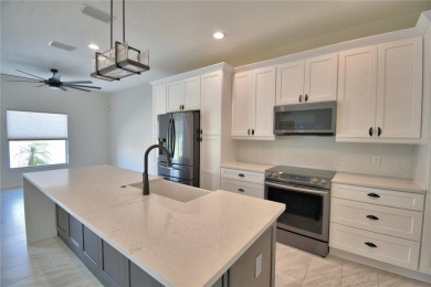Welcome to this beautifully updated 2-bedroom, 2-bathroom home on Lake Ashton Golf Club in Florida - for sale on GolfHomes.com, golf home, golf lot