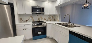 Spacious Remodel Experience the perfect blend of comfort on Palm-Aire Country Club and Resort - Palms in Florida - for sale on GolfHomes.com, golf home, golf lot