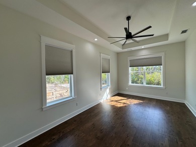 Stunning 2-story home in Sanctuary Beach gated community in on Bay Point Resort Golf Club in Florida - for sale on GolfHomes.com, golf home, golf lot