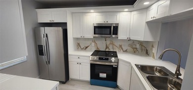 Spacious Remodel Experience the perfect blend of comfort on Palm-Aire Country Club and Resort - Palms in Florida - for sale on GolfHomes.com, golf home, golf lot