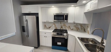 Spacious Remodel Experience the perfect blend of comfort on Palm-Aire Country Club and Resort - Palms in Florida - for sale on GolfHomes.com, golf home, golf lot