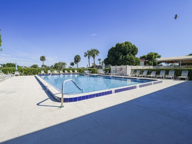 his turnkey 2 bedroom/2 bath condo has impact windows except for on The American Golf Club in Florida - for sale on GolfHomes.com, golf home, golf lot