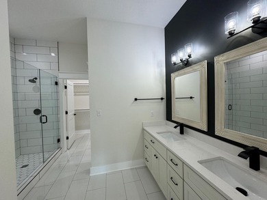 Stunning 2-story home in Sanctuary Beach gated community in on Bay Point Resort Golf Club in Florida - for sale on GolfHomes.com, golf home, golf lot