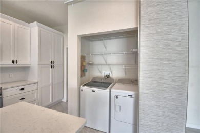 Welcome to this beautifully updated 2-bedroom, 2-bathroom home on Lake Ashton Golf Club in Florida - for sale on GolfHomes.com, golf home, golf lot