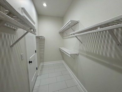 Stunning 2-story home in Sanctuary Beach gated community in on Bay Point Resort Golf Club in Florida - for sale on GolfHomes.com, golf home, golf lot