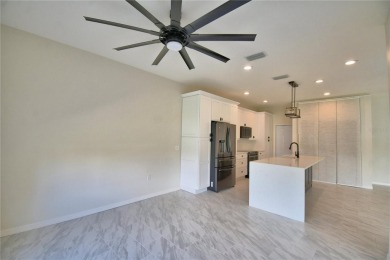 Welcome to this beautifully updated 2-bedroom, 2-bathroom home on Lake Ashton Golf Club in Florida - for sale on GolfHomes.com, golf home, golf lot