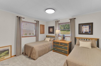 Welcome to your Lake Mohawk retreat! This stylishly remodeled on Lake Mohawk Golf Club in Ohio - for sale on GolfHomes.com, golf home, golf lot