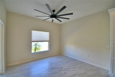 Welcome to this beautifully updated 2-bedroom, 2-bathroom home on Lake Ashton Golf Club in Florida - for sale on GolfHomes.com, golf home, golf lot