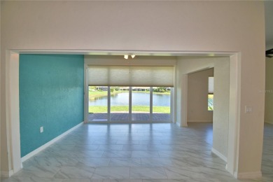 Welcome to this beautifully updated 2-bedroom, 2-bathroom home on Lake Ashton Golf Club in Florida - for sale on GolfHomes.com, golf home, golf lot