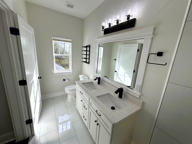 Stunning 2-story home in Sanctuary Beach gated community in on Bay Point Resort Golf Club in Florida - for sale on GolfHomes.com, golf home, golf lot