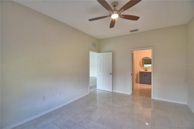 Welcome to this beautifully updated 2-bedroom, 2-bathroom home on Lake Ashton Golf Club in Florida - for sale on GolfHomes.com, golf home, golf lot