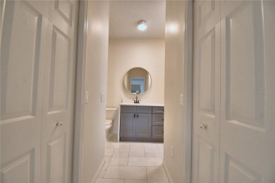 Welcome to this beautifully updated 2-bedroom, 2-bathroom home on Lake Ashton Golf Club in Florida - for sale on GolfHomes.com, golf home, golf lot