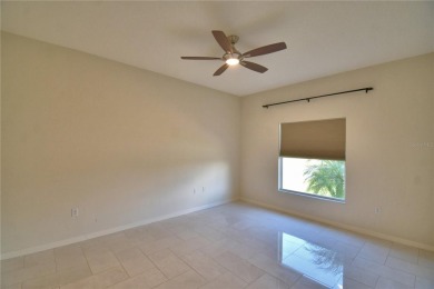 Welcome to this beautifully updated 2-bedroom, 2-bathroom home on Lake Ashton Golf Club in Florida - for sale on GolfHomes.com, golf home, golf lot