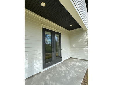 Stunning 2-story home in Sanctuary Beach gated community in on Bay Point Resort Golf Club in Florida - for sale on GolfHomes.com, golf home, golf lot