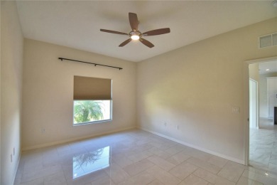 Welcome to this beautifully updated 2-bedroom, 2-bathroom home on Lake Ashton Golf Club in Florida - for sale on GolfHomes.com, golf home, golf lot