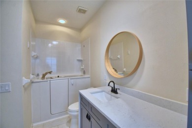 Welcome to this beautifully updated 2-bedroom, 2-bathroom home on Lake Ashton Golf Club in Florida - for sale on GolfHomes.com, golf home, golf lot
