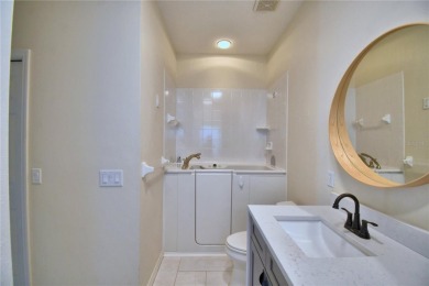Welcome to this beautifully updated 2-bedroom, 2-bathroom home on Lake Ashton Golf Club in Florida - for sale on GolfHomes.com, golf home, golf lot